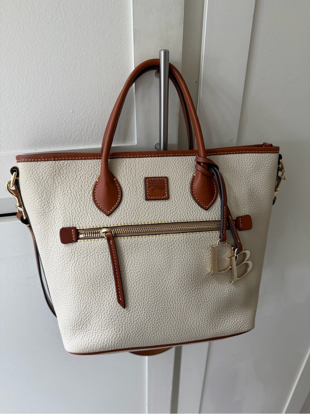 Dooney & Bourke Cream and Brown Pebbled Leather Tote with Charm